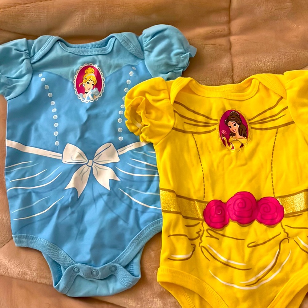 Cinderella and Belle baby onesies